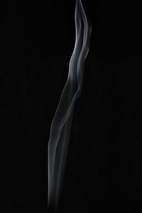 Close-up of smoke against black background