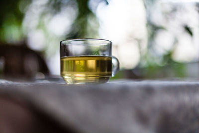 Close-up of tea cup of table