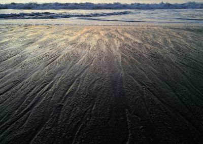 Scenic view of beach during sunset