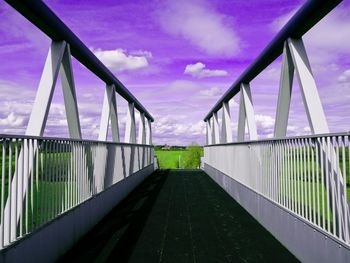 View of road against cloudy sky
