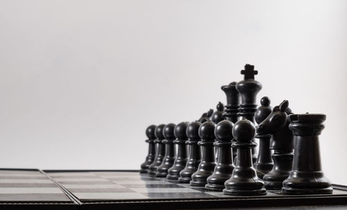 Full frame shot of chess pieces on board