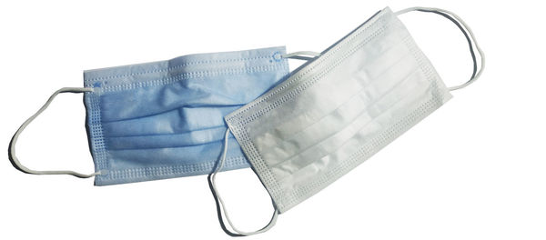 High angle view of empty seats against white background