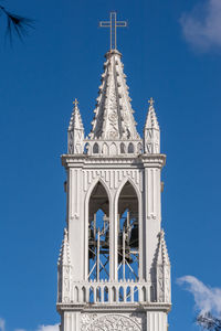 Low angle view of building against blue sky
