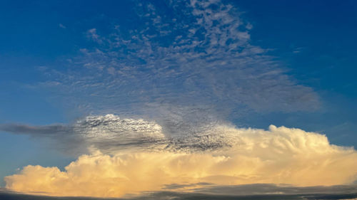 Low angle view of clouds in sky during sunset