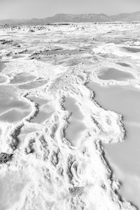 Scenic view of sea against sky during winter