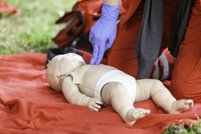 Baby or child cpr dummy first aid course. heart massage.