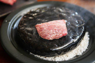 High angle view of meat in cooking pan