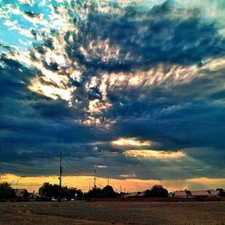 Scenic view of landscape against cloudy sky