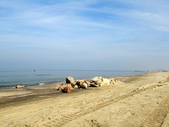 Scenic view of beach against sky