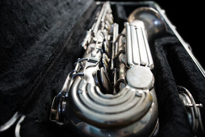 Close-up of saxophone on table