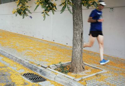 Man running on footpath