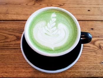 High angle view of cappuccino on table