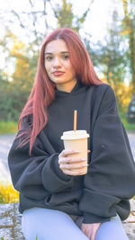 Young woman using mobile phone