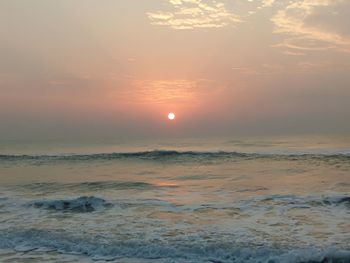 View of calm sea at sunset