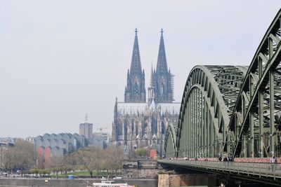 Panoramic view of buildings in city against sky