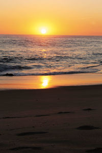 Scenic view of sea at sunset