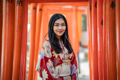 Portrait of smiling young woman