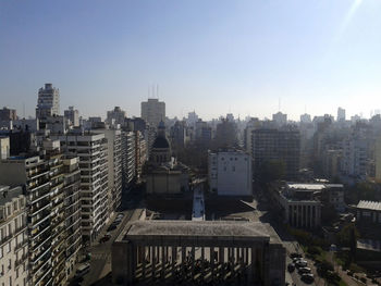 Cityscape against clear sky