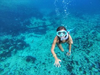 Close-up of girl swimming in sea