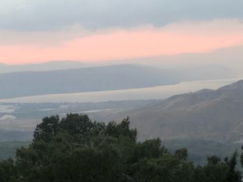 Scenic view of mountains against sky during sunset