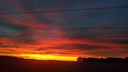 Scenic view of dramatic sky during sunset