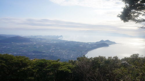 Scenic view of tree mountains against sky