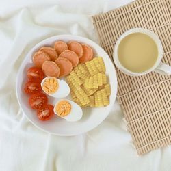High angle view of breakfast served on table
