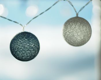 Close-up of christmas decoration hanging on plant