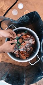 High angle view of man preparing food