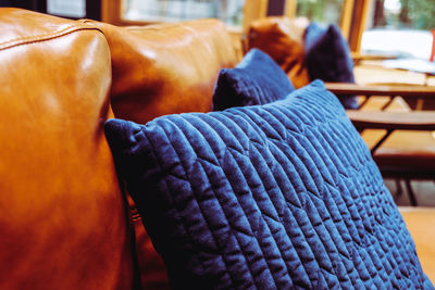 Blue cushion on sofa at home