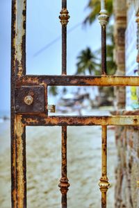 Close-up of rusty metal fence