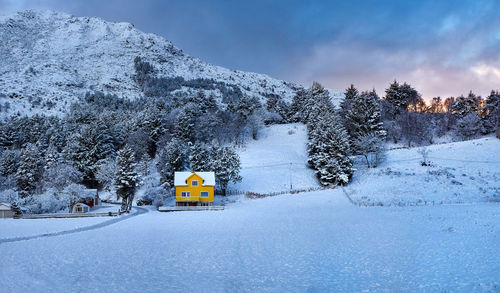 Lonely house on godøy in winter, sunnmøre, møre og romsdal, norway.