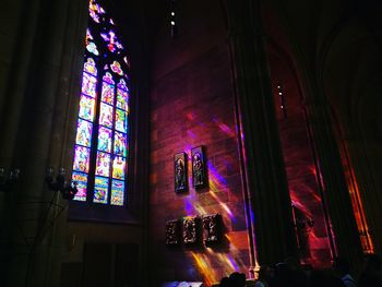 Low angle view of illuminated window in building