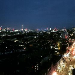 Illuminated cityscape at night