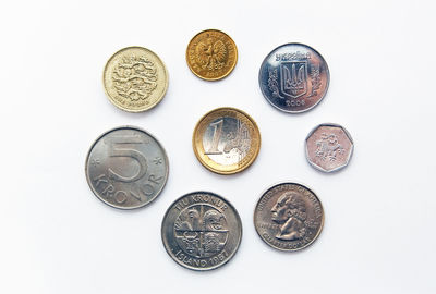 Close-up of coins on white background