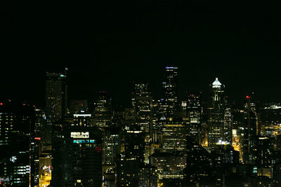 Illuminated cityscape at night