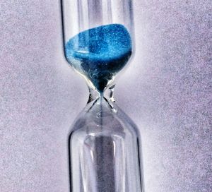 Close-up of glass over black background