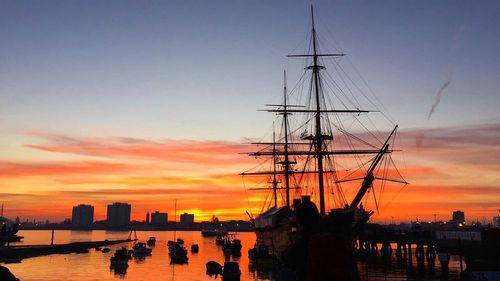 Silhouette of harbor at sunset