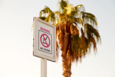 Close-up of information sign