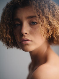 Close-up portrait of young woman