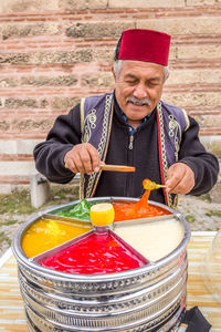 Portrait of a man holding food