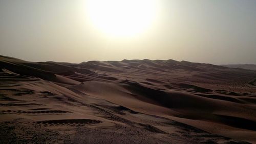 Scenic view of desert against clear sky