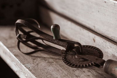 High angle view of old machine on table