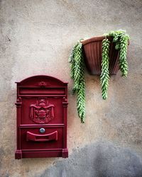 Close-up of mailbox on wall