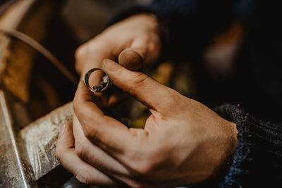 Close-up of woman holding hands