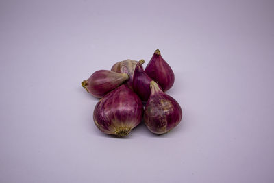 Close-up of fruits against white background