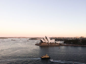 Scenic view of sea against clear sky during sunset