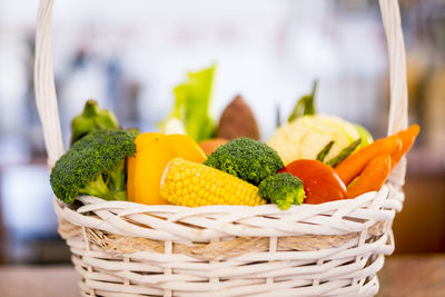 Close-up of fruits in basket on table