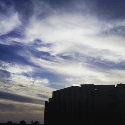 Low angle view of city against sky