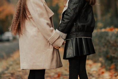 Girlfriends in the autumn forest